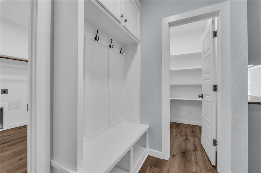 Mudroom featuring dark wood-type flooring Mudroom featuring dark wood-type flooring
