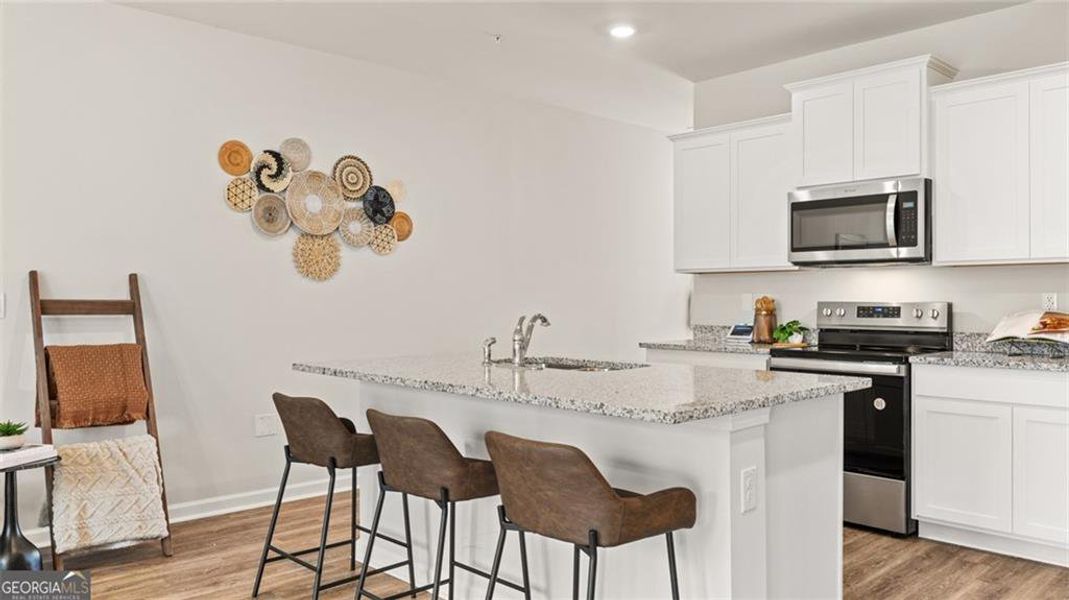 Furnished interior view inside a new home in Echo Glen, Stockbridge (Image 12).