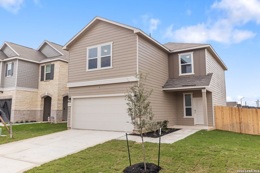 Front exterior of a new home in Southton Cove, Elmendorf, TX, highlighting curb appeal (Image 19).