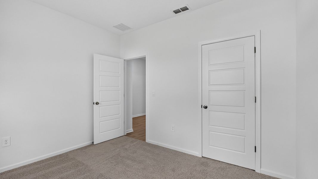 Representative unfurnished interior of a home built from the Aria+ by D.R. Horton in Diamond Springs, Jacksonville (Image 22).