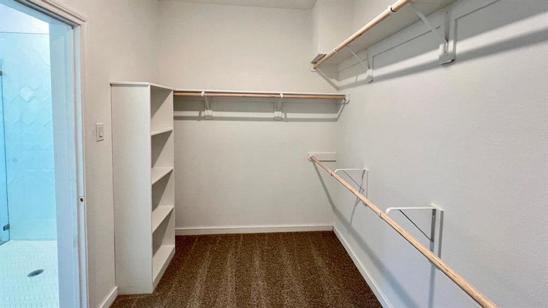 Huge primary walk-in closet