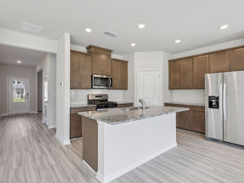 Furnished interior view inside a new home in Northwoods at Mirror Lake, Villa Rica (Image 3).