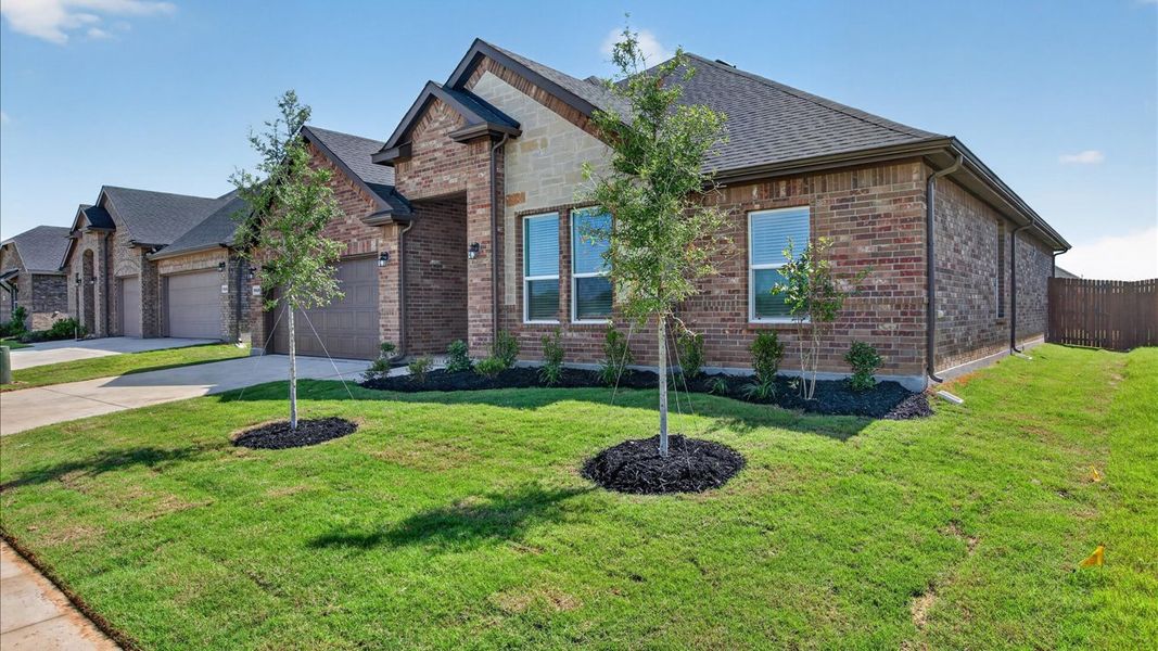 Representative exterior photo of a completed home built from the Odessa by D.R. Horton in Lakeview Pointe, Midlothian, TX (Image 2).