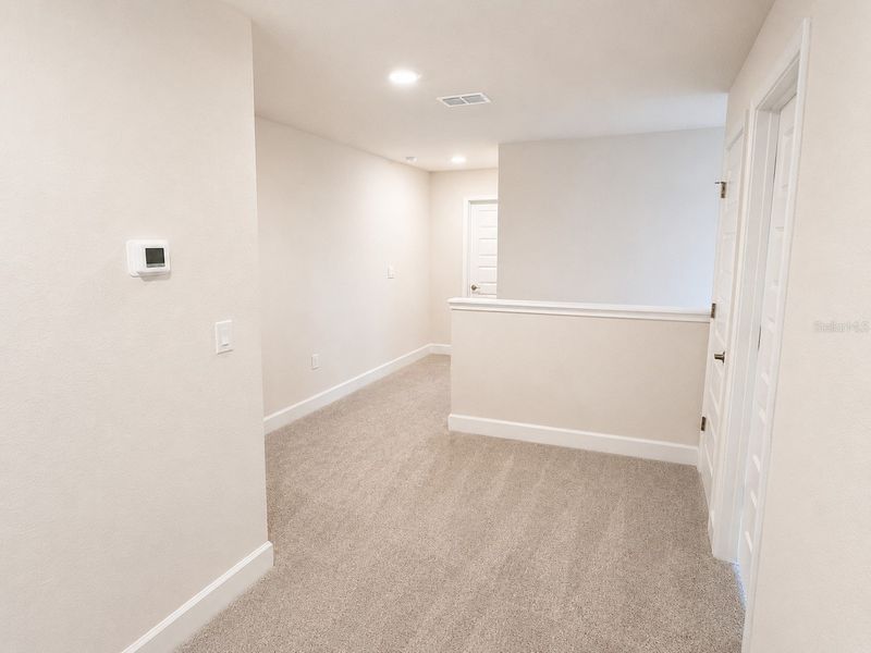 Spacious, unfurnished interior of a new home in Harmony Central, Harmony (Image 7).