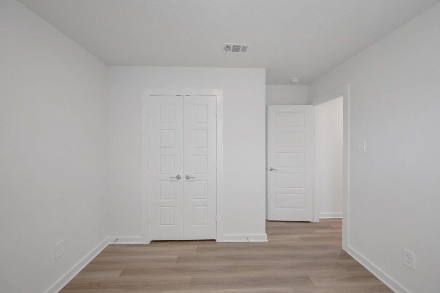 Spacious, unfurnished interior of a new home in Pinewood at Grand Texas, New Caney (Image 15).