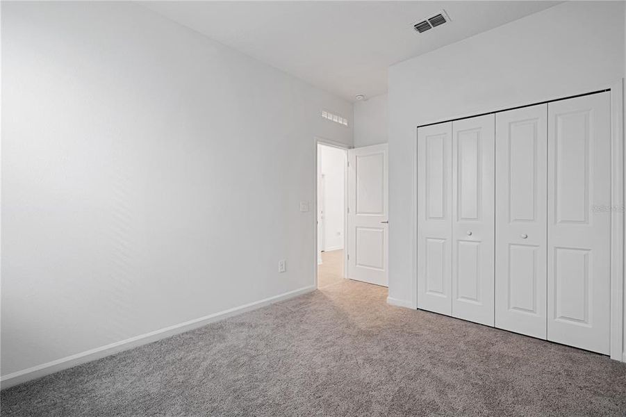 Spacious, unfurnished interior of a new home in Wellness Ridge, Clermont (Image 24).