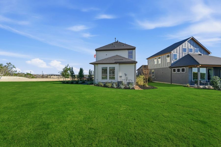 Exterior details and patio area of a home in Prominence, San Antonio (Image 31).
