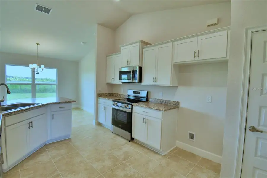 Furnished interior view inside a new home in Cadence Crossing, Auburndale (Image 4).