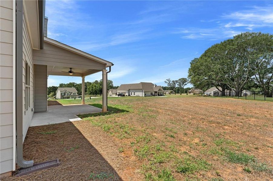 Front exterior of a new home in , Jefferson, GA, highlighting curb appeal (Image 23).