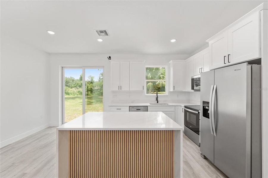Furnished interior view inside a new home in , Summerfield (Image 9).