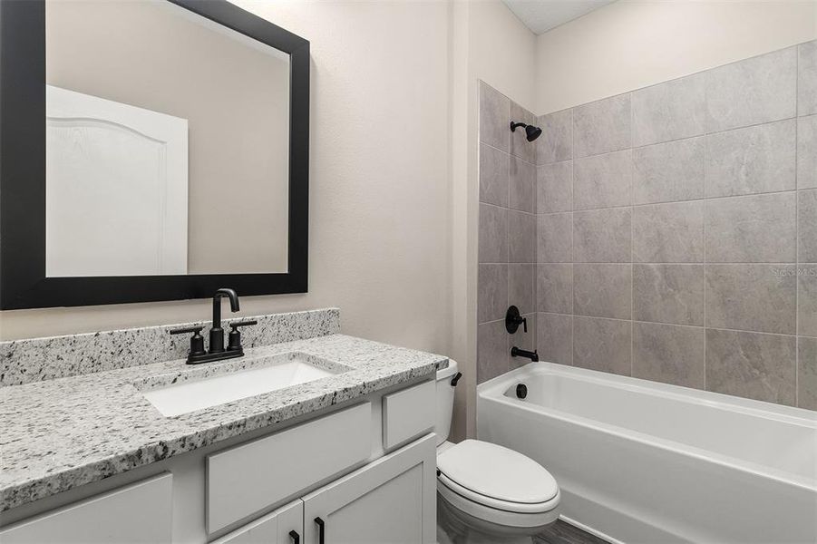 Furnished interior view inside a new home in , Kissimmee (Image 2). Furnished interior view inside a new home in , Kissimmee (Image 2).