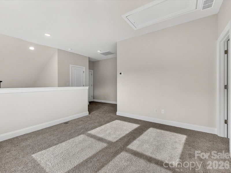 Spacious, unfurnished interior of a new home in North Creek Village, Huntersville (Image 36).