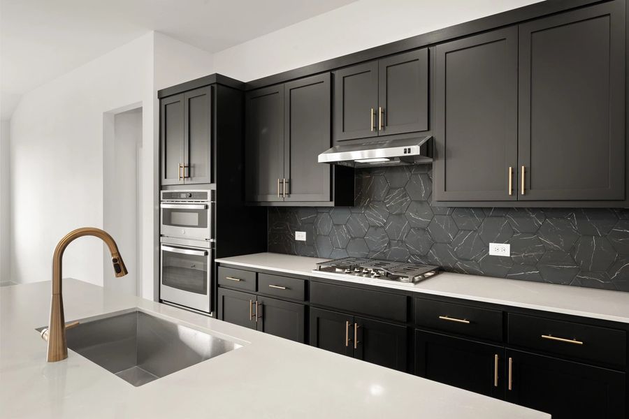 Kitchen featuring the Noir Collection Kitchen featuring the Noir Collection