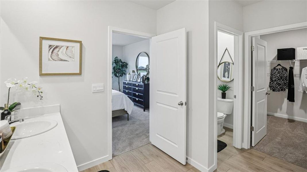 Furnished interior view inside a new home in Seagrass - Express & Tradition, Punta Gorda (Image 24). Furnished interior view inside a new home in Seagrass - Express & Tradition, Punta Gorda (Image 24).