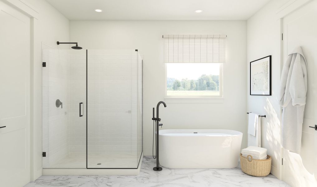 Primary bath with freestanding tub and glass shower enclosure