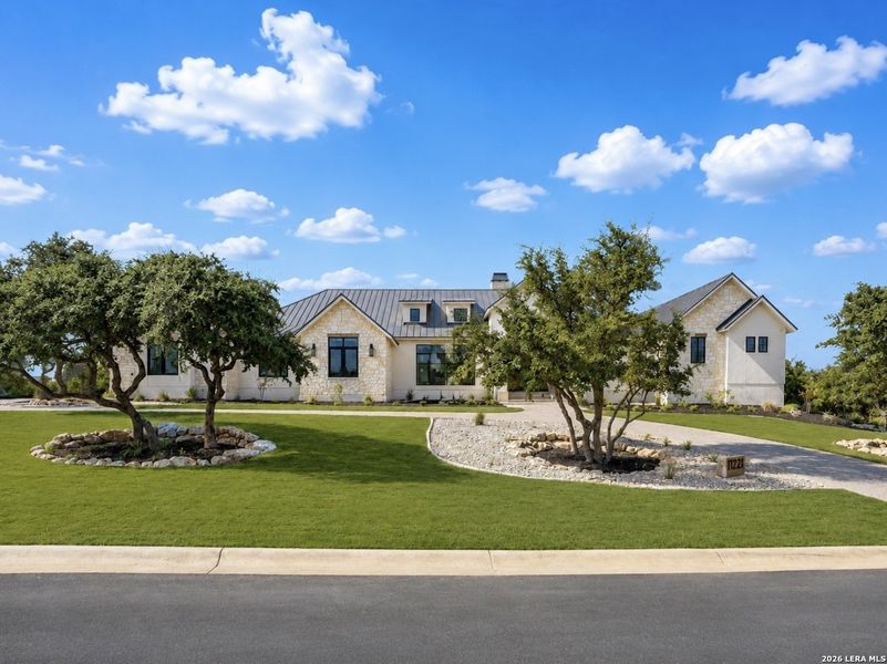 Front exterior of a new home in , Boerne, TX, highlighting curb appeal (Image 27). Front exterior of a new home in , Boerne, TX, highlighting curb appeal (Image 27).