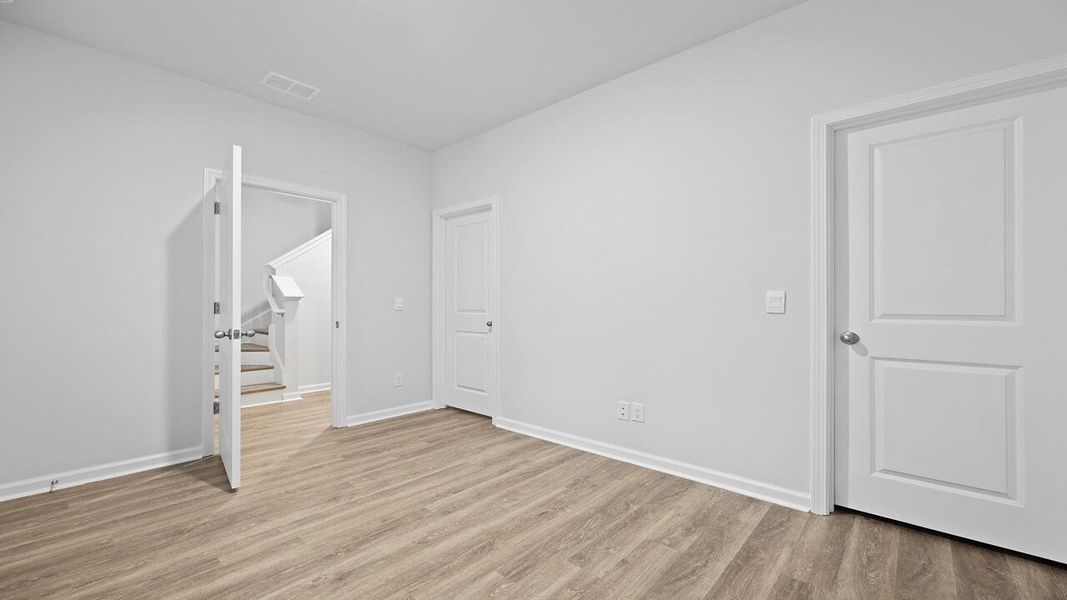 Spacious, unfurnished interior of a new home in Garbon Fields, Summerville (Image 28).
