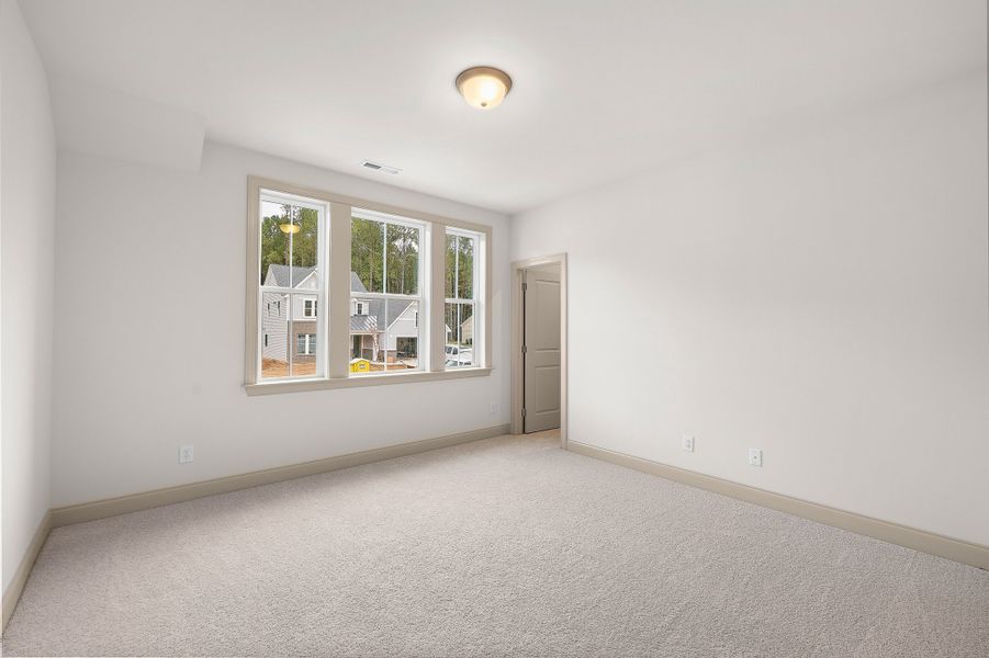 Representative unfurnished interior of a home built from the The Hampton by RobuckHomes in Baylee Ridge, Selma (Image 190).