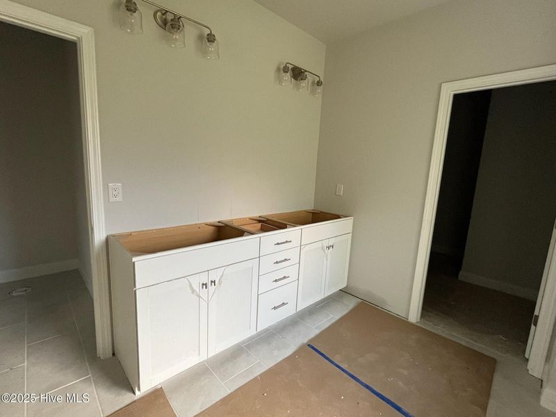 Furnished interior view inside a new home in Palmetto Creek, Bolivia (Image 2).