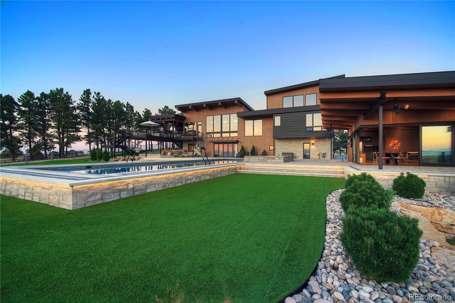 Front exterior of a new home in , Parker, CO, highlighting curb appeal (Image 24).