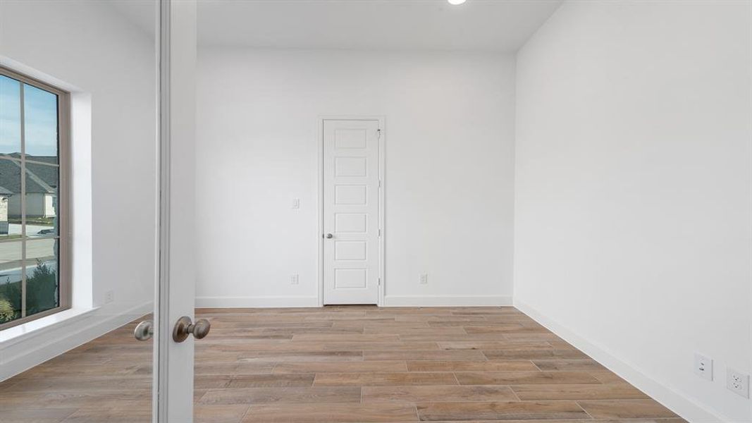 Spacious, unfurnished interior of a new home in Devonshire 55', Forney (Image 22).