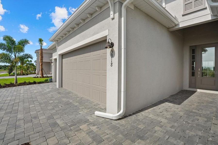 Exterior details and patio area of a home in Calusa Country Club, Lakewood Ranch (Image 20).