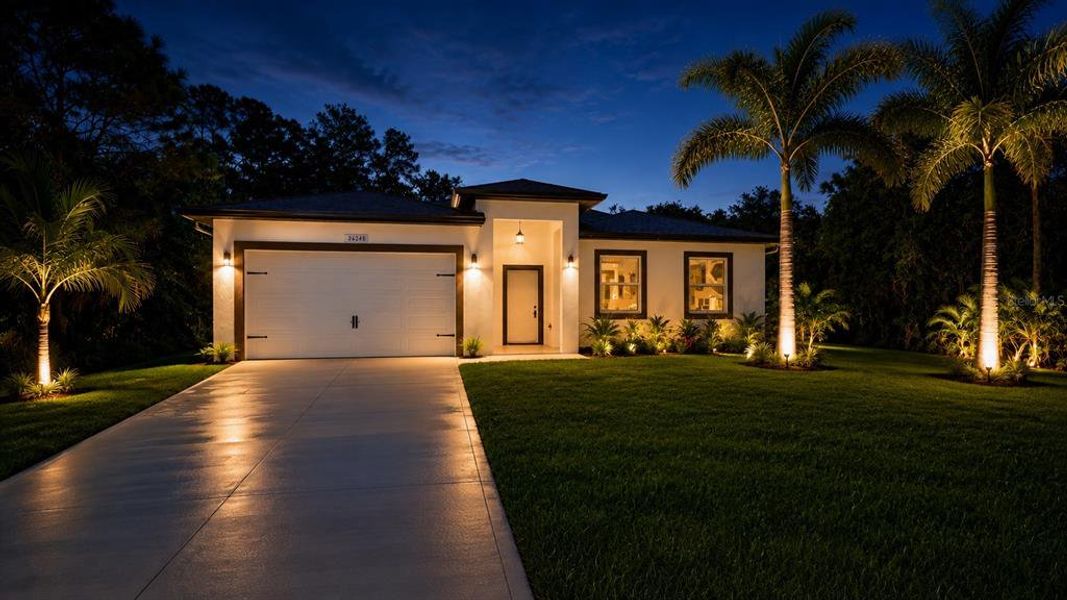 Front exterior of a new home in , Punta Gorda, FL, highlighting curb appeal (Image 2). Front exterior of a new home in , Punta Gorda, FL, highlighting curb appeal (Image 2).