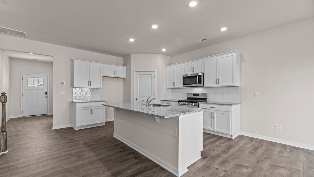 Furnished interior view inside a new home in East Ridge, Ayden (Image 6).