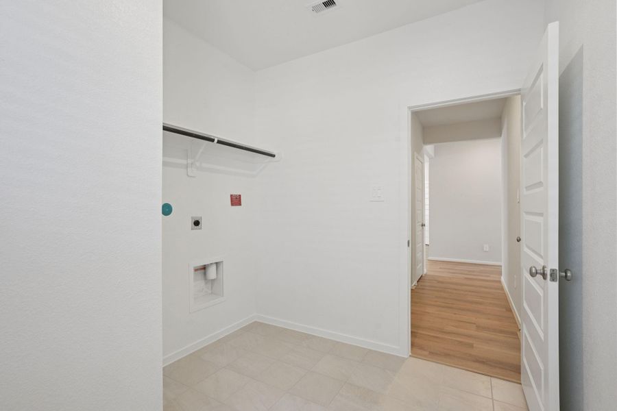 Photo is not of the actual home, but is an inspirational photo of builder’s model home and may depict options, furnishings, and/or decorator features that are not included