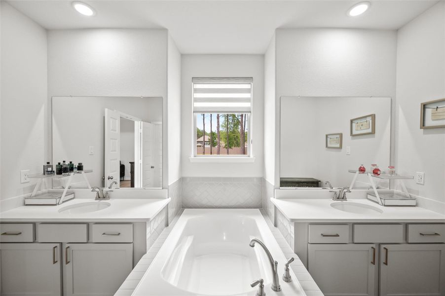Window overlooking the backyard, allowing abundant natural light.