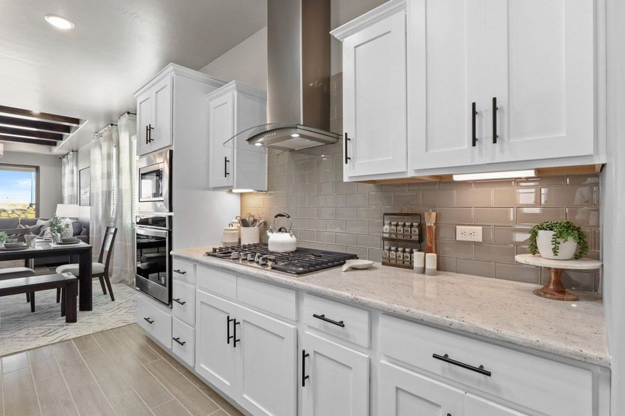Representative furnished interior of a home built from the Pershing by Hakes Brothers in Paseo Del Este, El Paso (Image 3).