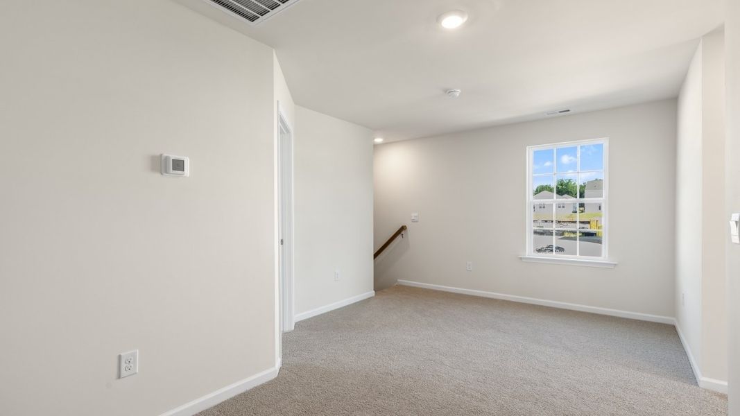 Spacious, unfurnished interior of a new home in The Grove at Matthews Landing, Fuquay Varina (Image 20).