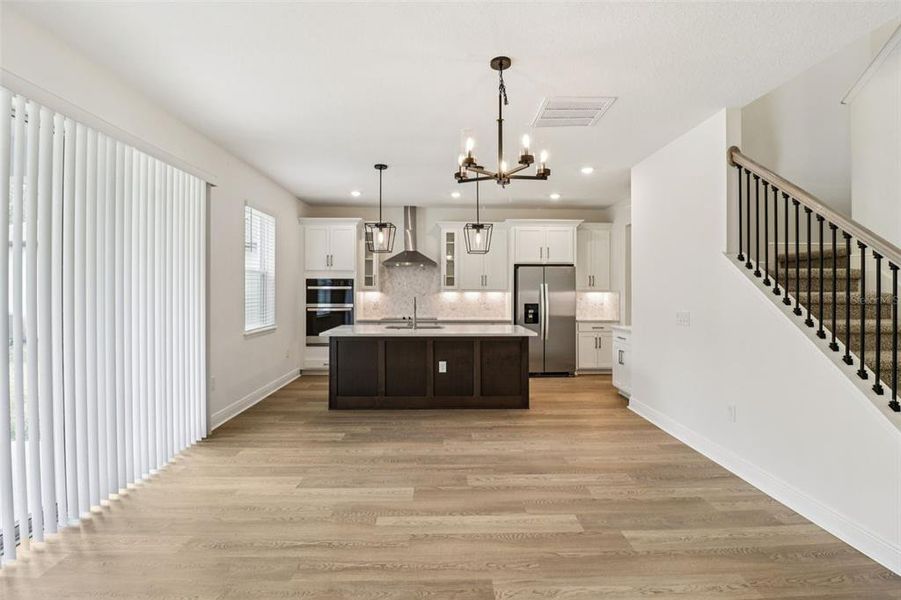 Furnished interior view inside a new home in Legends Preserve - Signature Series, Daytona Beach (Image 9).