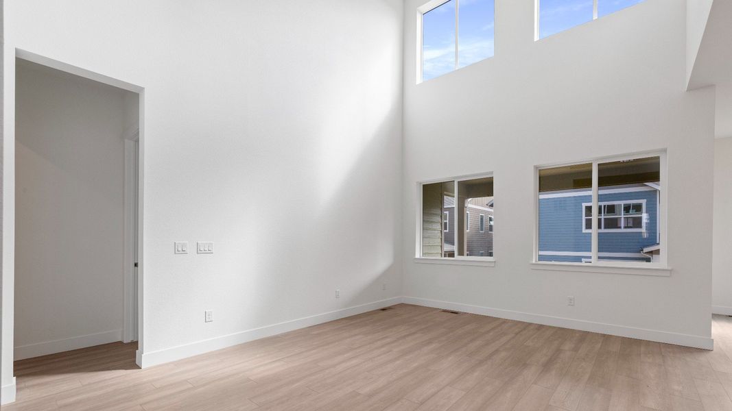 Furnished interior view inside a new home in Dillon Pointe - Journey, Broomfield (Image 9).