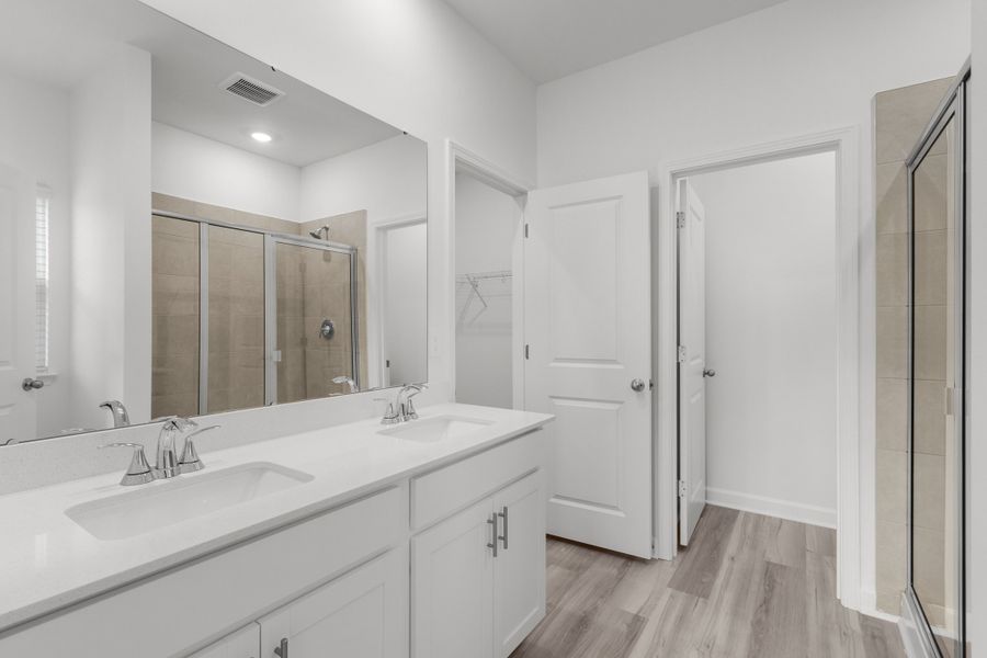 Furnished interior view inside a new home in Cypress Ridge - The Boardwalk Series, Longs (Image 9).