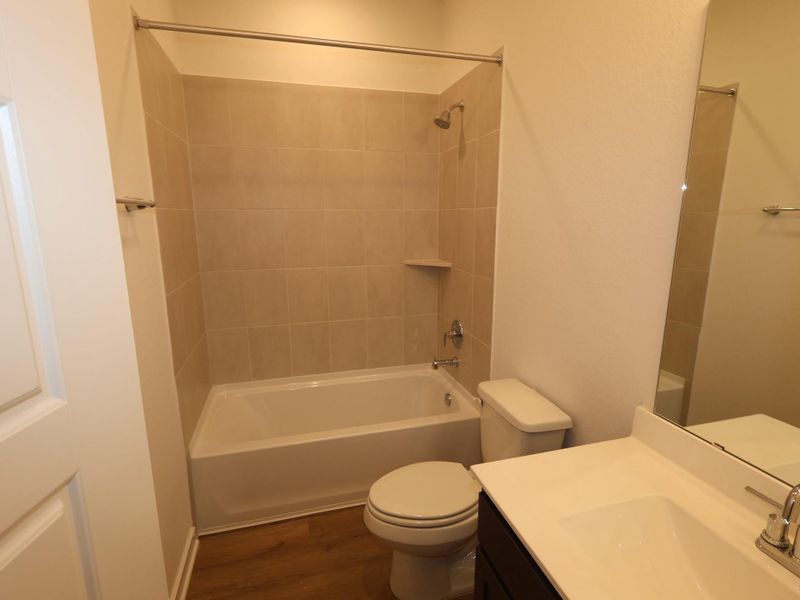 Furnished interior view inside a new home in Pinewood at Grand Texas, New Caney (Image 16).