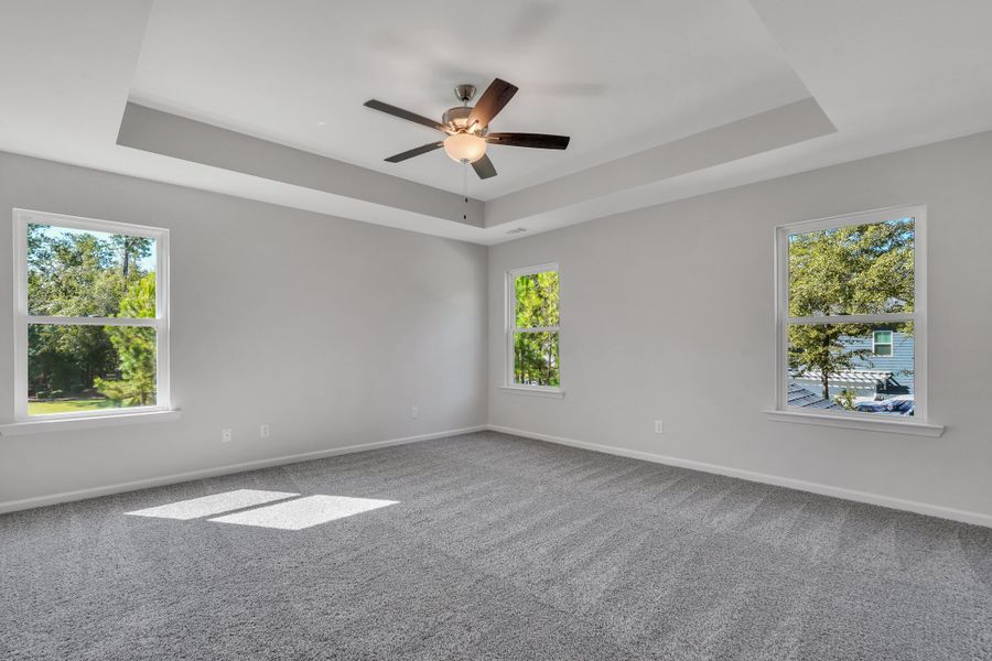 Representative unfurnished interior of a home built from the The Hatteras by Smith Family Homes in Ramsey Landing, Rincon (Image 24).
