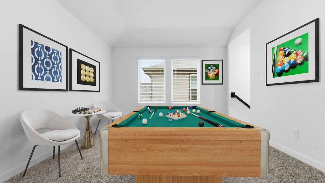 A spacious upstairs living area with plenty of natural light from windows overlooking side of the home A spacious upstairs living area with plenty of natural light from windows overlooking side of the home