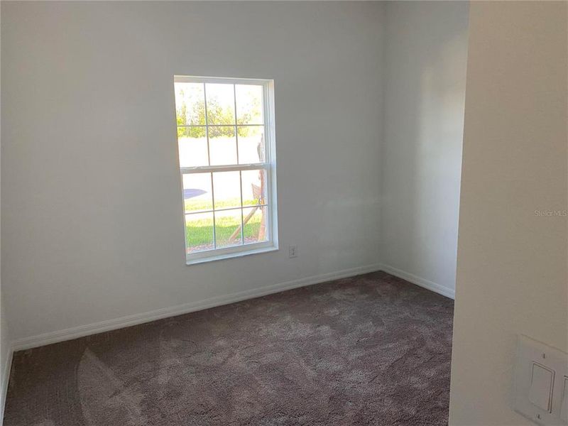 Spacious, unfurnished interior of a new home in K-Bar Ranch Gilded Woods, Tampa (Image 8).