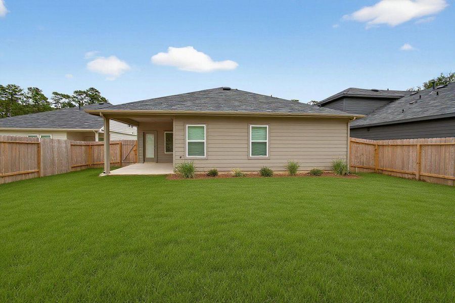 Exterior details and patio area of a home in Grand Pines, Magnolia (Image 21).