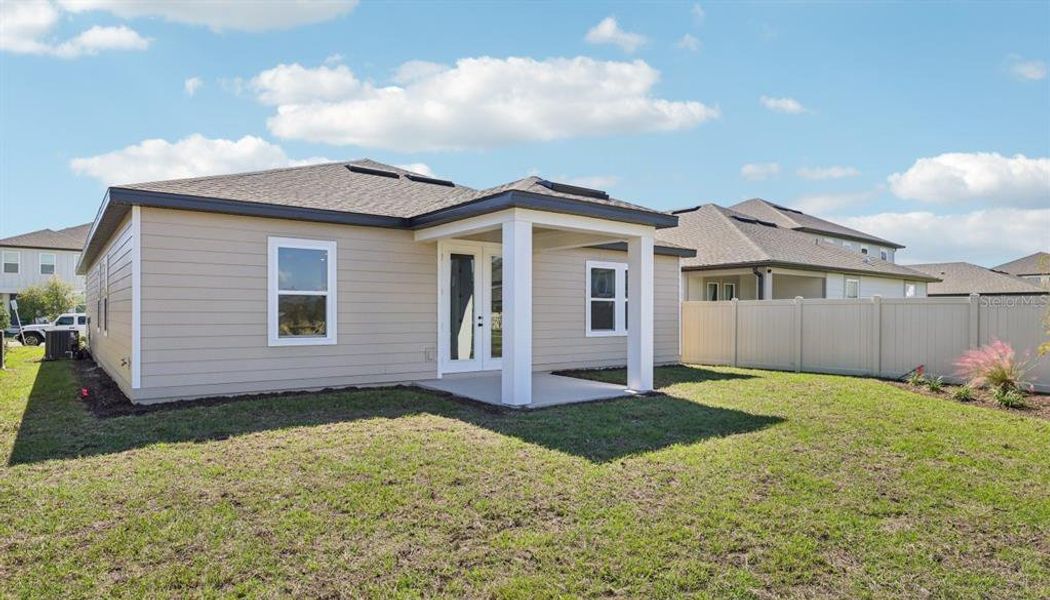 Exterior details and patio area of a home in Ellington Traditional, St. Cloud (Image 19). Exterior details and patio area of a home in Ellington Traditional, St. Cloud (Image 19).