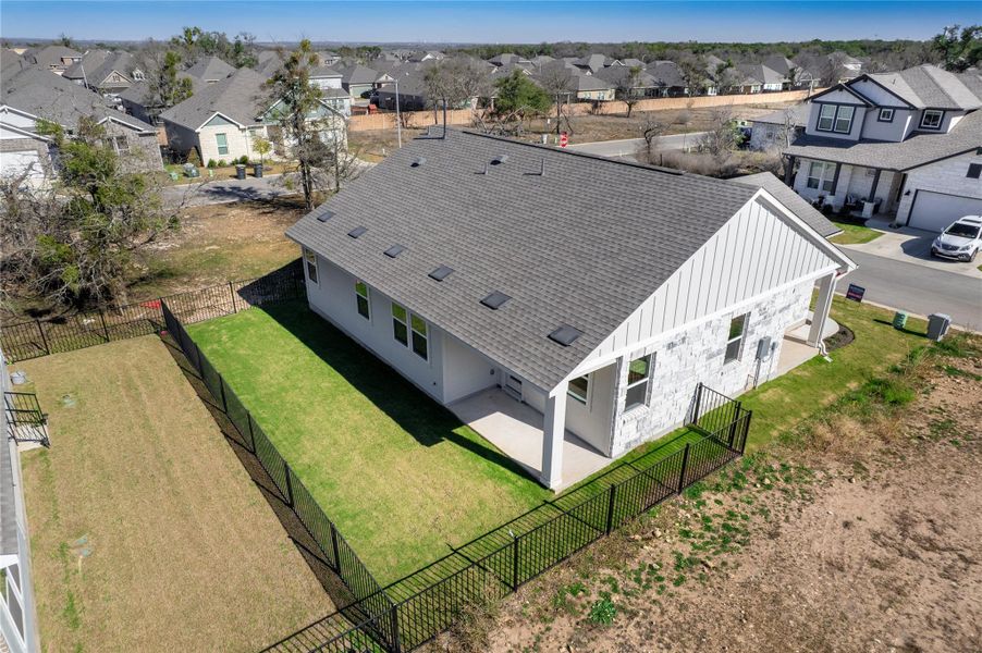Exterior details and patio area of a home in Anthem Cottages, Kyle (Image 25).