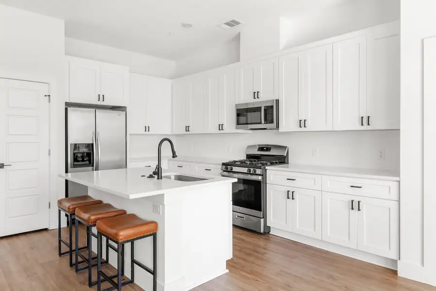 Furnished interior view inside a new home in East Grove Condominiums, Austin (Image 8).