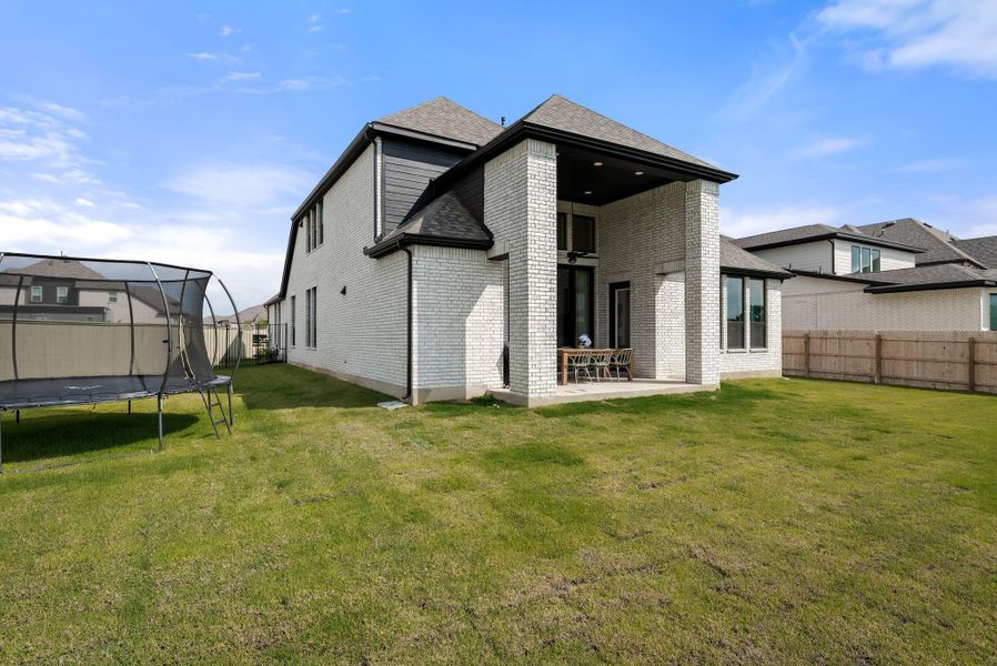 Exterior details and patio area of a home in Santa Rita Ranch, Liberty Hill (Image 22).