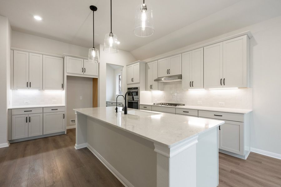 Representative furnished interior of a home built from the Carolina by Ashton Woods in The Estates at La Cima, San Marcos (Image 5). Representative furnished interior of a home built from the Carolina by Ashton Woods in The Estates at La Cima, San Marcos (Image 5).