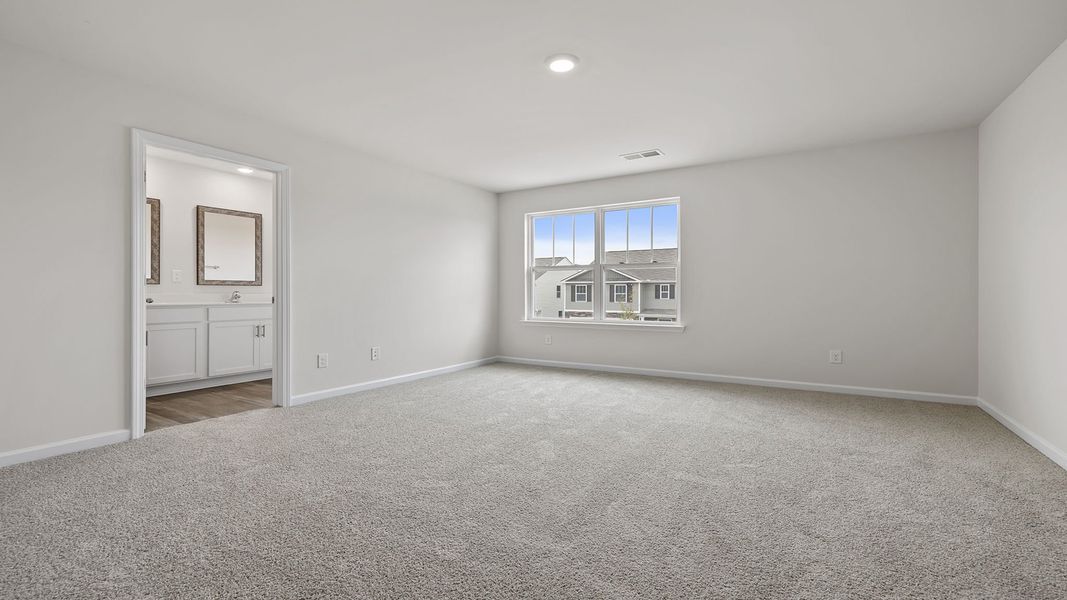 Spacious, unfurnished interior of a new home in Village Grove, Greenville (Image 26).