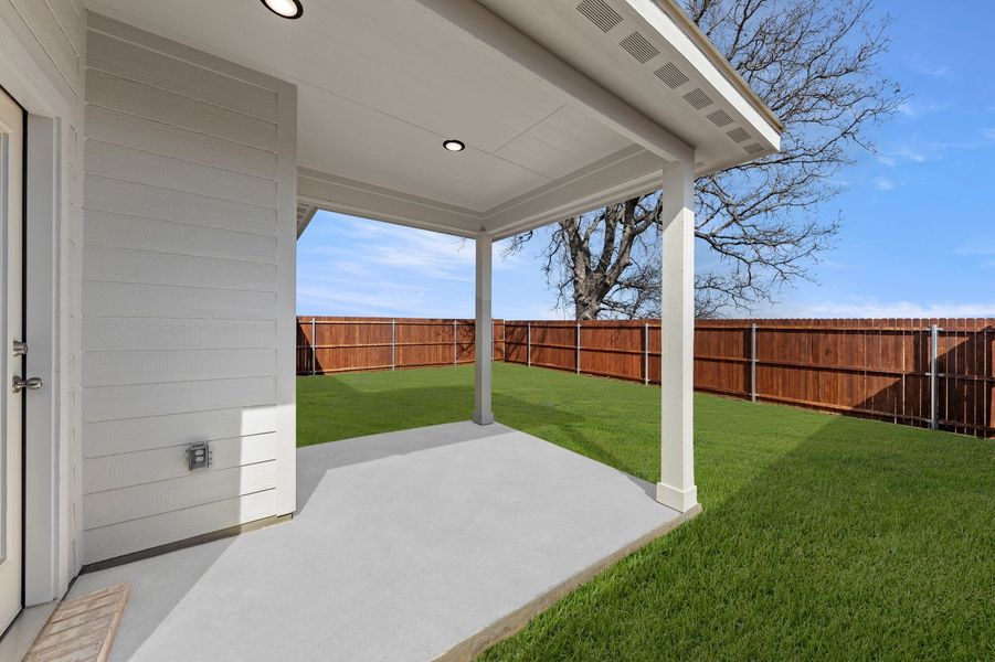 Front exterior of a new home in Belmont, Aubrey, TX, highlighting curb appeal (Image 28). Front exterior of a new home in Belmont, Aubrey, TX, highlighting curb appeal (Image 28).