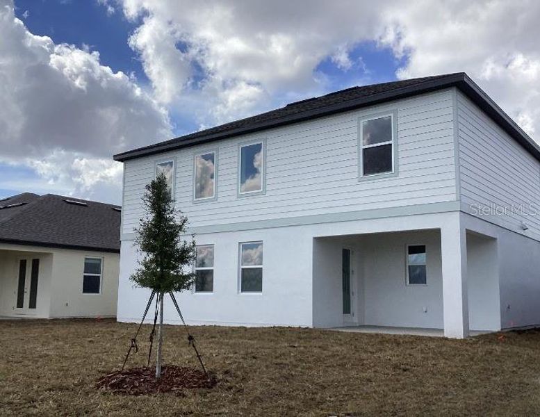 Exterior details and patio area of a home in Catamaran Cove, Rockledge (Image 3).