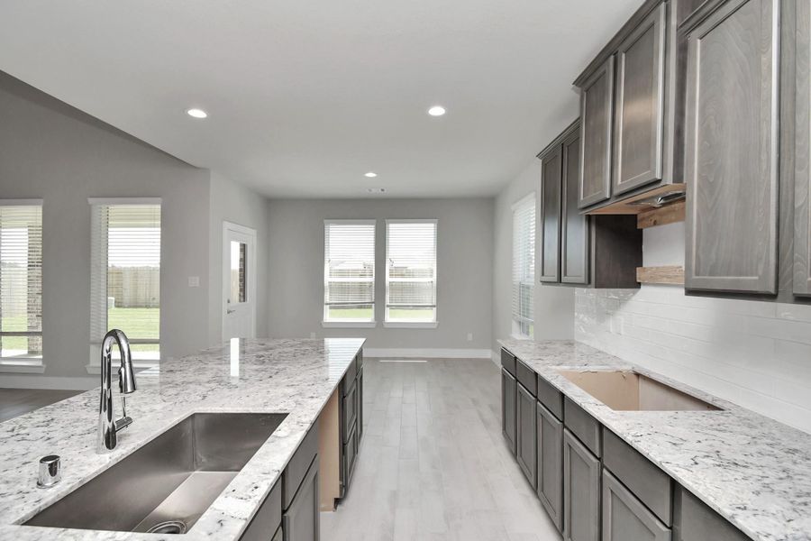 Sample photo of completed home with similar floor plan. Actual colors and selections may vary. Sample photo of completed home with similar floor plan. Actual colors and selections may vary.