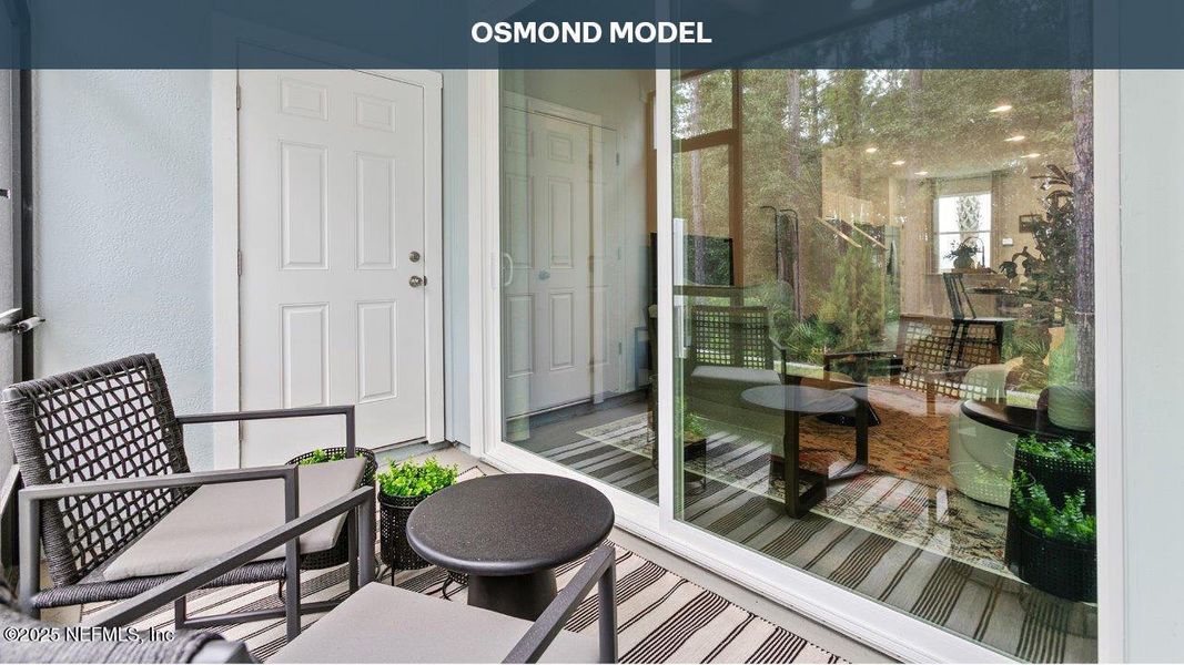 Exterior details and patio area of a home in Cordera Townhomes, St. Augustine (Image 21).